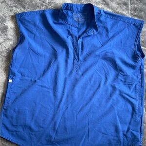 Winning blue women’s FIGS scrub set